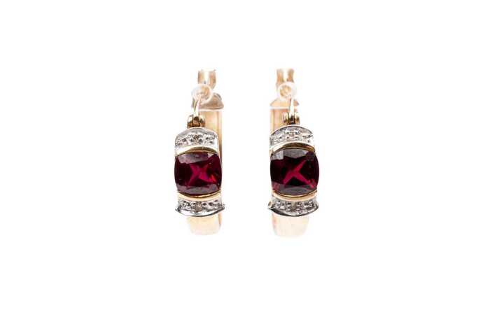 A pair of synthetic ruby and diamond hoops in 9 carat yellow gold