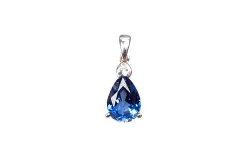 A synthetic sapphire and natural diamond pendant in 9 carat white gold