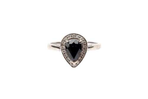 A sapphire and diamond ring in 10 carat white gold