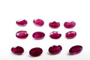 A collection of fourteen natural oval rubies - 2