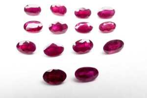 A collection of fourteen natural oval rubies - 3