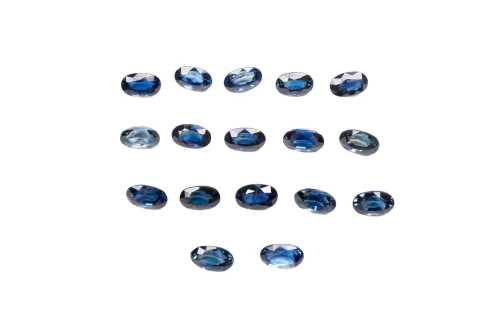 A collection of seventeen oval natural sapphires