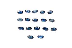A collection of seventeen oval natural sapphires