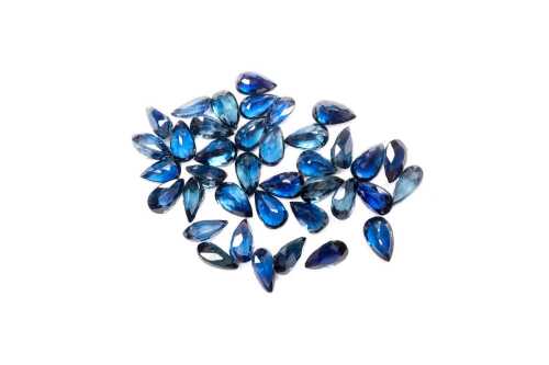 A collection of thirty-eight pear cut natural sapphires