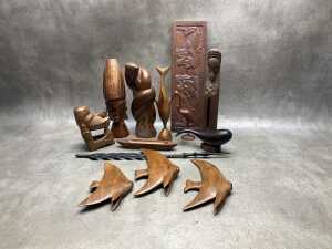 Carved timber decorative items, including animal figures