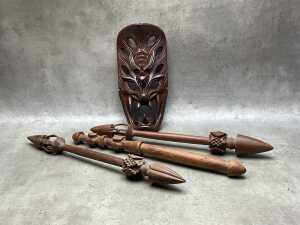 Carved timber decorative items, including masks, wall panels, spears - 4