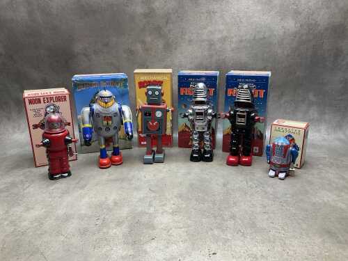 Six mechanical robot toys, some new, all boxed