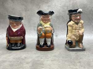 Three Royal Doulton porcelain Toby jugs