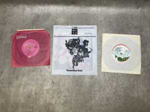 Nine vinyl records, including 7" singles - 4
