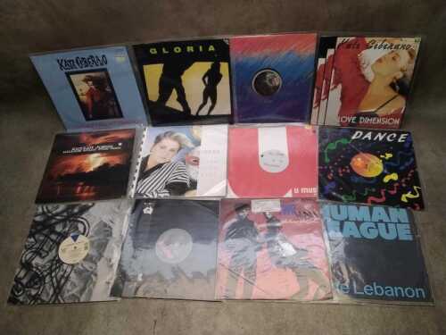 Twelve 12" vinyl singles, including The Human League
