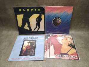 Twelve 12" vinyl singles, including The Human League - 2