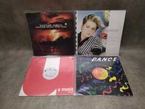 Twelve 12" vinyl singles, including The Human League - 3