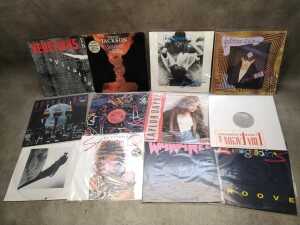 Twelve 12" vinyl singles, including Michael Jackson