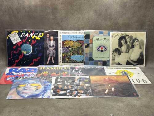 Twelve 12" vinyl singles, including Dexy's Midnight Runners