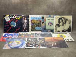 Twelve 12" vinyl singles, including Dexy's Midnight Runners