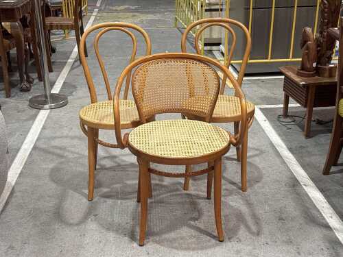 Three rattan chairs