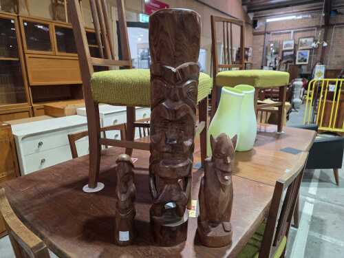 Three timber Oceanic carved figures