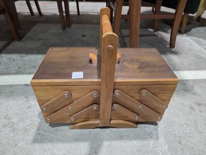 Timber cantilever sewing box with assorted haberdashery