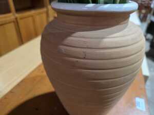 Terracotta ribbed vase displaying vibrant artificial Birds of Paradise blooms - 4