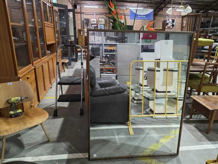 Dark timber framed wall mirror
