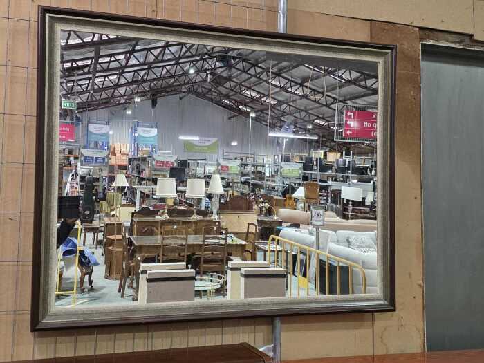 Rectangular black and grey framed mirror