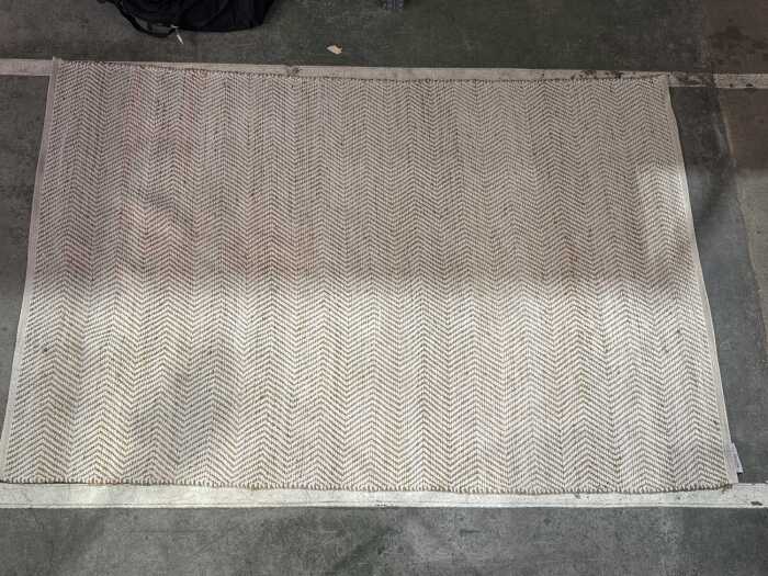 La Grolla herringbone floor rug