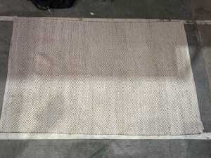 La Grolla herringbone floor rug