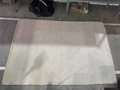 Grey and cream woven floor rug