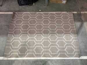 Geometric patterned floor rug