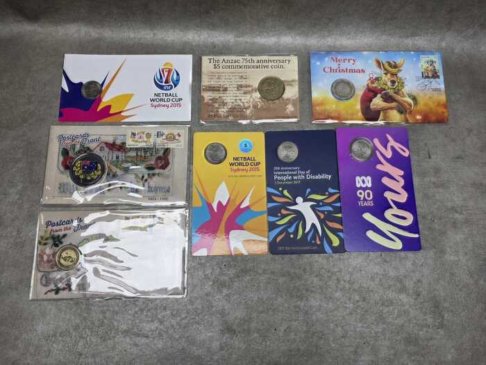 Eight commemorative coins