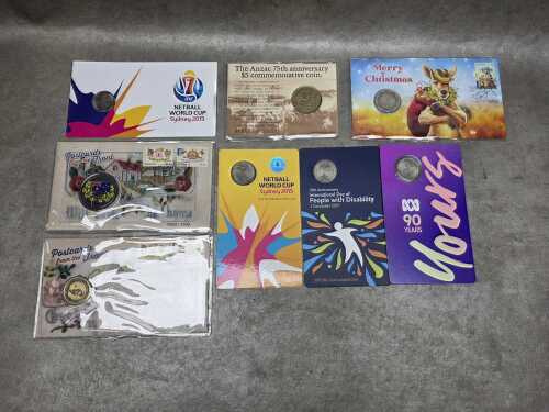 Eight commemorative coins