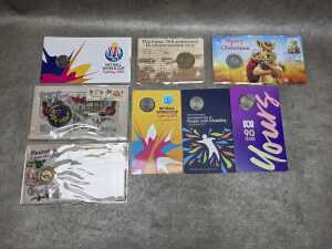 Eight commemorative coins