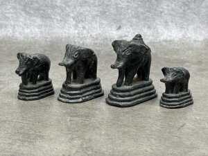 Antique Burmese set of four brass opium weights surmounted by elephant figures