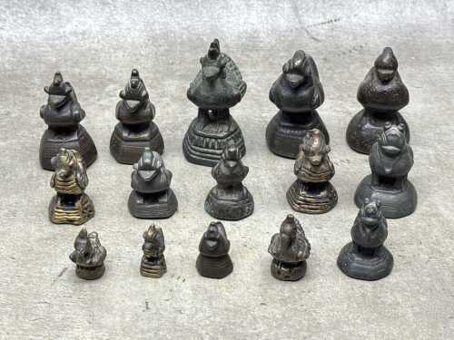 Antique Burmese metal opium weights surmounted by various animal figures