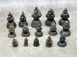 Antique Burmese metal opium weights surmounted by various animal figures