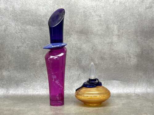 Two perfume glass and plastic store display bottles