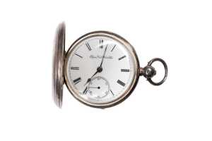 An antique Elgin pocket watch in sterling silver