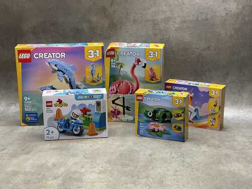 Five LEGO sets, sealed