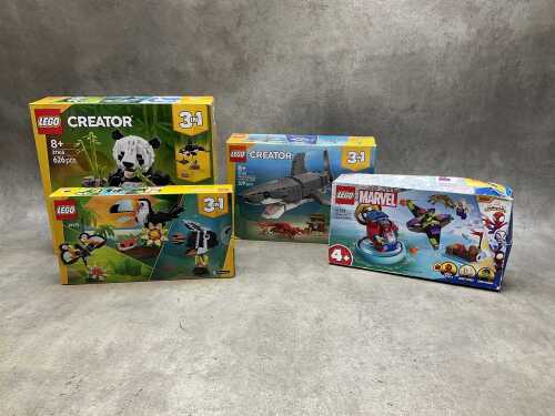 Four LEGO sets, sealed