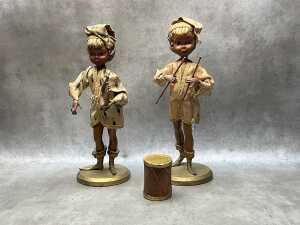 Two mid-century timber musician figures