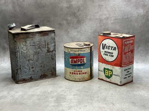 Three oil and petrol tin cans
