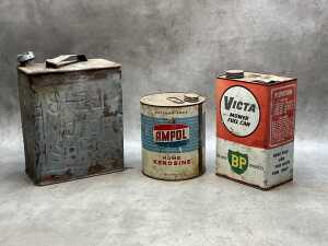 Three oil and petrol tin cans