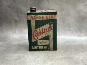 Three oil tin cans, including Esso - 2