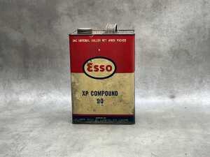 Three oil tin cans, including Esso - 3