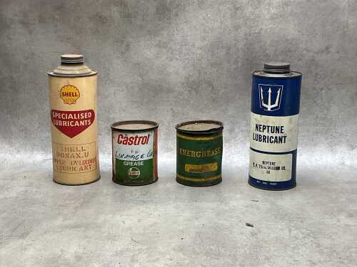 Four oil tins, including Shell lubricant