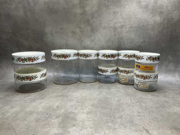 Ten Pyrex 'Spice of Life' Store 'n' See glass storage canisters