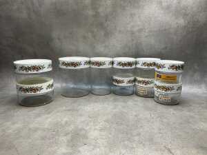 Ten Pyrex 'Spice of Life' Store 'n' See glass storage canisters
