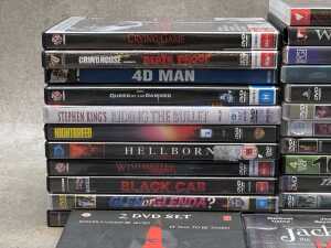 DVDs, mostly horror films, including Queen of the Damned - 2