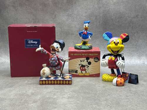 Three Disney ceramic figures, two boxed