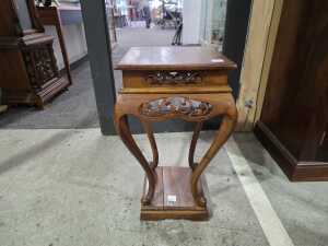 Carved timber pedestal